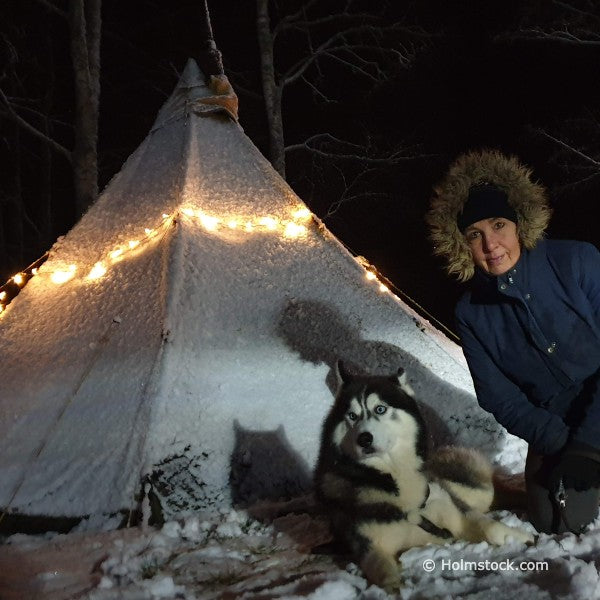 Winter Camping with a Tentipi Safir 9CP close to Stockholm Sweden. Outdoor experiences by Holmstock Travel.